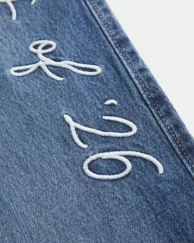 Low-Rise Dark Wash Class of ’26 Broderade Baggy Jeans Low-Rise Dark Wash Class of ’26 Broderade Baggy Jeans