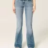 Low-Rise Distressed Medium Wash Bootcut-jeans Low-Rise Distressed Medium Wash Bootcut-jeans
