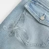Low-Rise Medium Wash Broderade Butterfly Bootcut Jeans