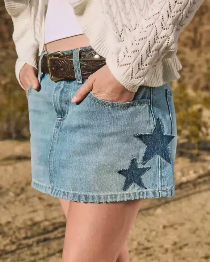 Low-Rise Medium Wash Star Applique Denim Mini Skort Low-Rise Medium Wash Star Applique Denim Mini Skort