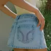 Low-Rise Pink Brodered Light Wash Denim Mini Skort Low-Rise Pink Brodered Light Wash Denim Mini Skort