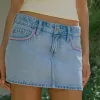 Low-Rise Pink Brodered Light Wash Denim Mini Skort Low-Rise Pink Brodered Light Wash Denim Mini Skort