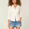Low-Rise Ripped Dark Wash Denim Mini Skort Low-Rise Ripped Dark Wash Denim Mini Skort