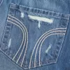 Low-Rise Ripped Dark Wash Denim Mini Skort Low-Rise Ripped Dark Wash Denim Mini Skort