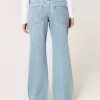 Low-Rise Ripped Light Wash Baggy Jeans Low-Rise Ripped Light Wash Baggy Jeans