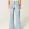 Low-Rise Ripped Light Wash Graphic Baggy Jeans Low-Rise Ripped Light Wash Graphic Baggy Jeans