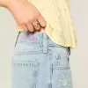 Low-Rise Ripped Light Wash Graphic Baggy Jeans Low-Rise Ripped Light Wash Graphic Baggy Jeans