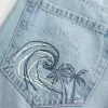 Low-Rise Ripped Light Wash Graphic Baggy Jeans Low-Rise Ripped Light Wash Graphic Baggy Jeans