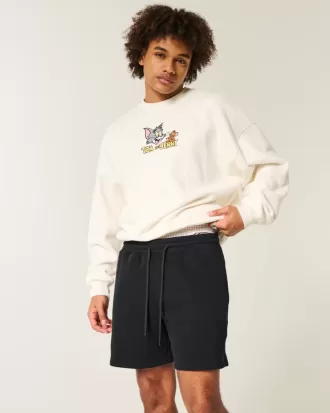 Lös fleeceshorts på mitten av låret