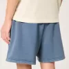 Lös fleeceshorts på mitten av låret