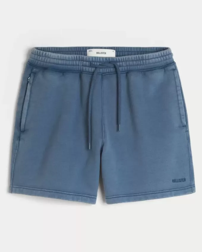 Lös fleeceshorts på mitten av låret