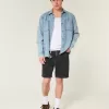 Lösa jeansshorts ovanför knäet Lösa jeansshorts ovanför knäet