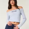 Lätt New York grafisk topp från axeln Lätt New York grafisk topp från axeln