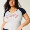 Lätt notch-neck Sweet ’n Sporty Graphic Baby Tee Lätt notch-neck Sweet ’n Sporty Graphic Baby Tee
