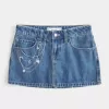 Medium Wash Broderad Chain Denim Mini Skort