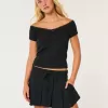 Mid-Rise Plisserat Mini Skort Mid-Rise Plisserat Mini Skort