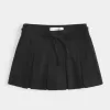 Mid-Rise Plisserat Mini Skort Mid-Rise Plisserat Mini Skort
