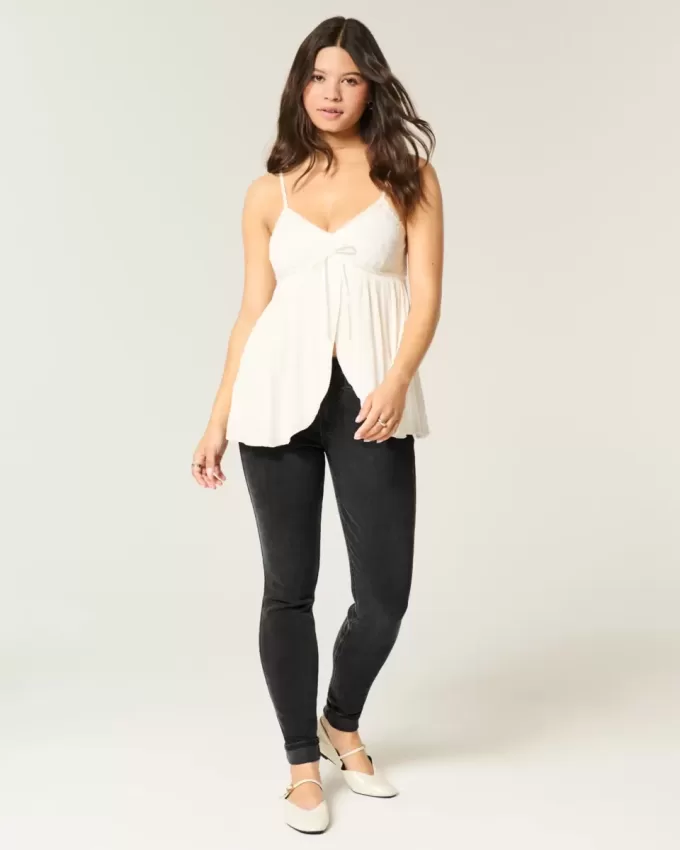 Mid-Rise tvättade svarta skinny jeans