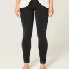 Mid-Rise tvättade svarta skinny jeans