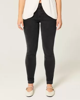 Mid-Rise tvättade svarta skinny jeans