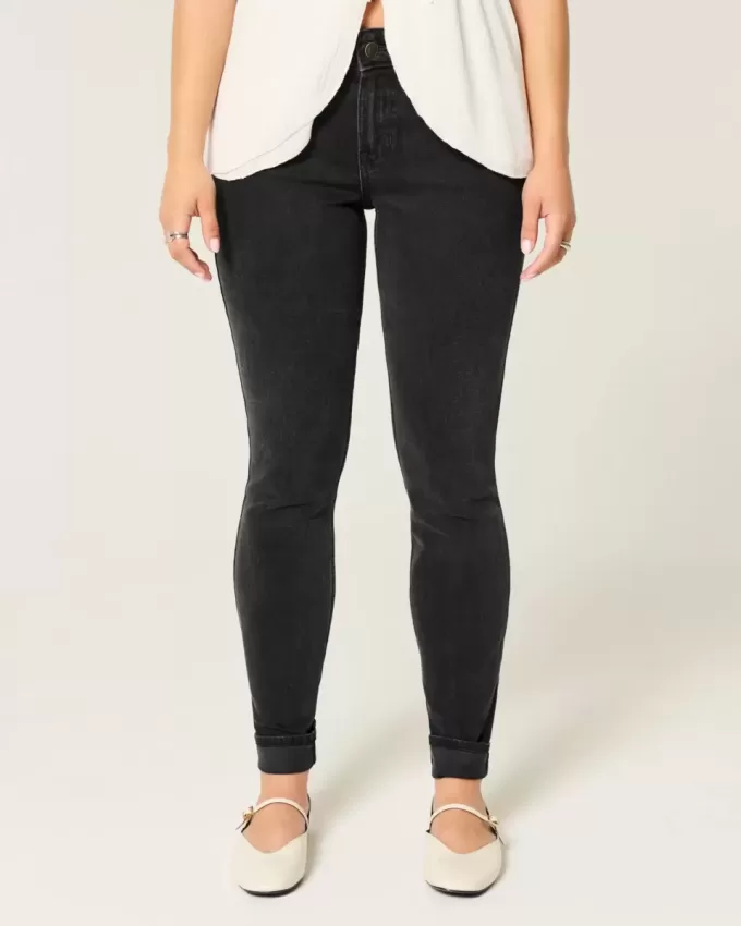 Mid-Rise tvättade svarta skinny jeans