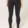 Mid-Rise tvättade svarta skinny jeans