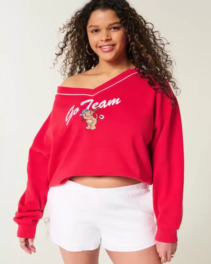 Oversized Go Team grafisk tröja med V-ringad Oversized Go Team grafisk tröja med V-ringad