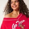 Oversized Go Team grafisk tröja med V-ringad Oversized Go Team grafisk tröja med V-ringad