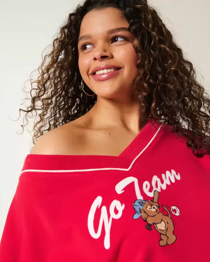 Oversized Go Team grafisk tröja med V-ringad Oversized Go Team grafisk tröja med V-ringad