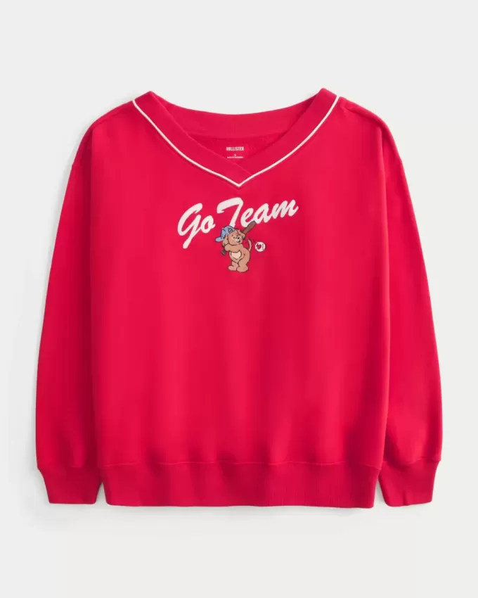 Oversized Go Team grafisk tröja med V-ringad Oversized Go Team grafisk tröja med V-ringad