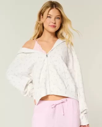 Oversized hoodie med dragkedja i blommönster