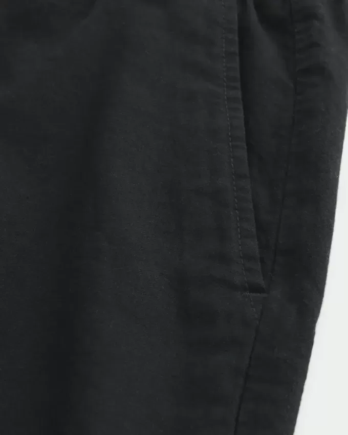 Pådragsshorts i linneblandning på mitten av låret