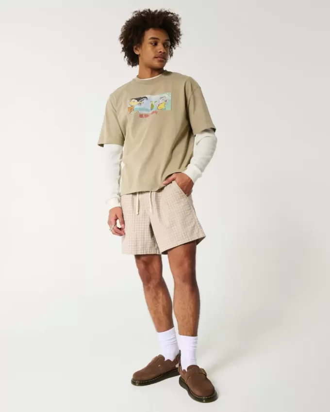 Pådragsshorts i linneblandning på mitten av låret