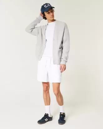 Pådragsshorts i linneblandning på mitten av låret