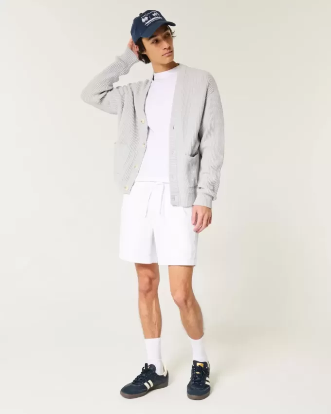Pådragsshorts i linneblandning på mitten av låret