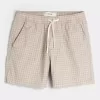 Pådragsshorts i linneblandning på mitten av låret