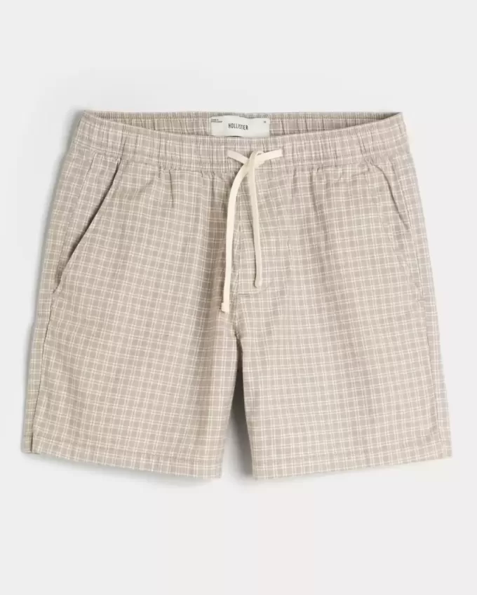 Pådragsshorts i linneblandning på mitten av låret