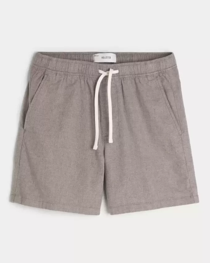 Pådragsshorts i linneblandning på mitten av låret