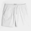 Pådragsshorts i linneblandning på mitten av låret