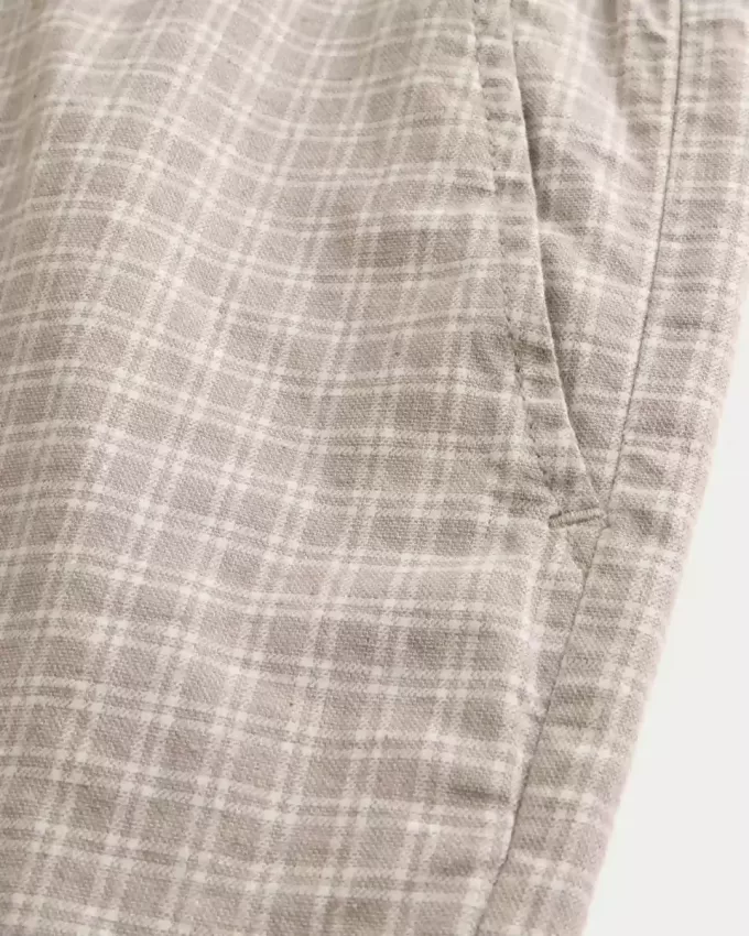 Pådragsshorts i linneblandning på mitten av låret