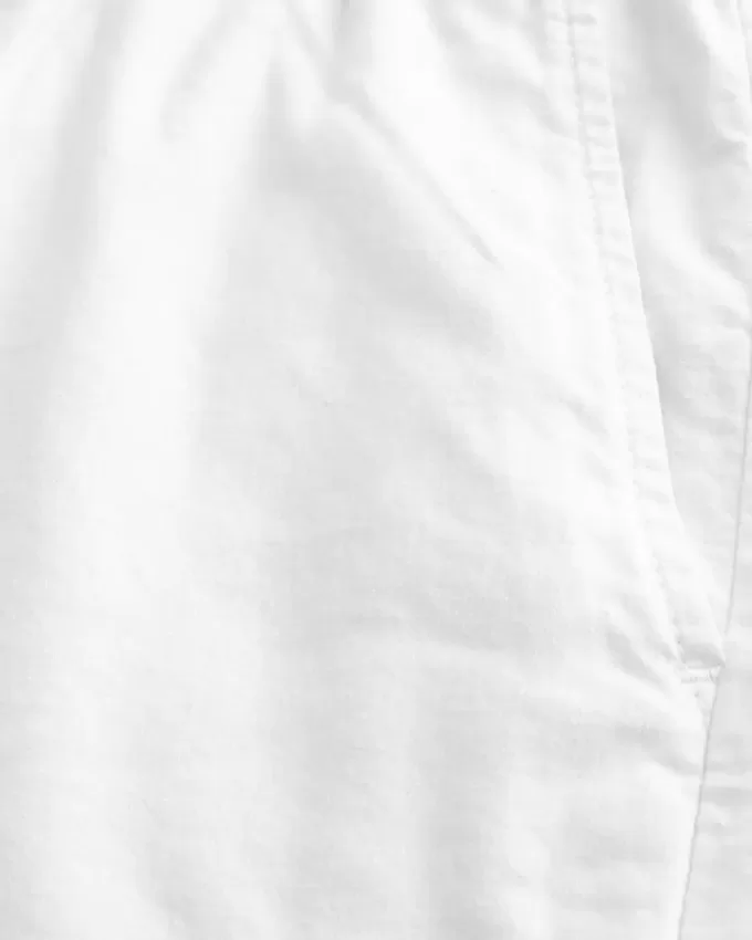 Pådragsshorts i linneblandning på mitten av låret