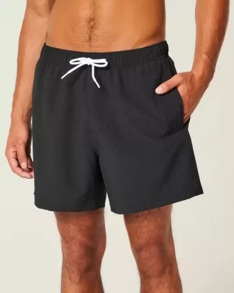 Seersucker volley badshorts på mitten av låret