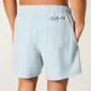 Seersucker volley badshorts på mitten av låret Seersucker volley badshorts på mitten av låret