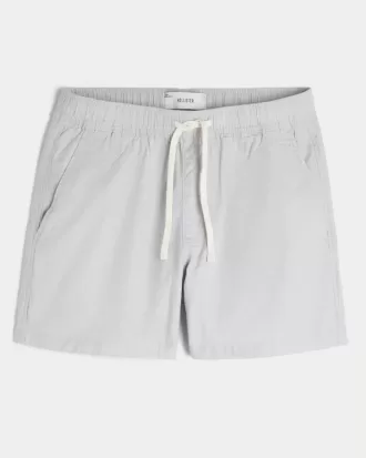 Shorts i linneblandning på mitten av låret