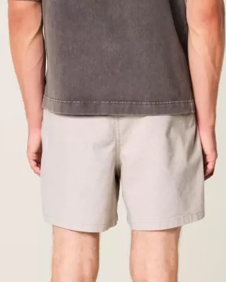 Shorts i linneblandning på mitten av låret