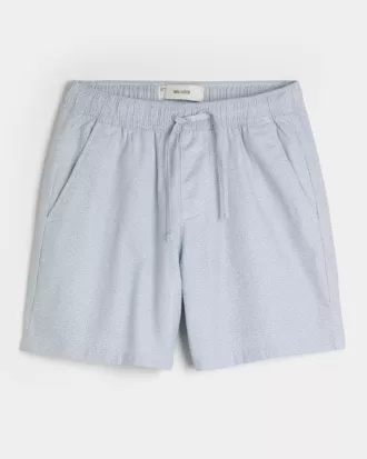 Shorts med linneblandning över knäet