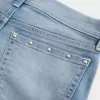 Shorts-shorts i denim med dubb i medeltvätt med låg höjd