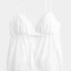 Skimrande broderad Babydoll-topp Skimrande broderad Babydoll-topp