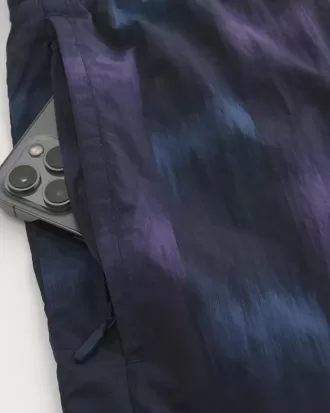 Trackshorts i nylon över knäet