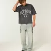 Tungvikt Baggy Crop Detroit Grafisk fotboll T-shirt Tungvikt Baggy Crop Detroit Grafisk fotboll T-shirt